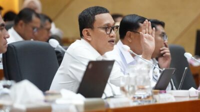 Menteri Abdul Kadir Karding dalam rapat kerja KemenP2MI dan Komisi IX DPR RI